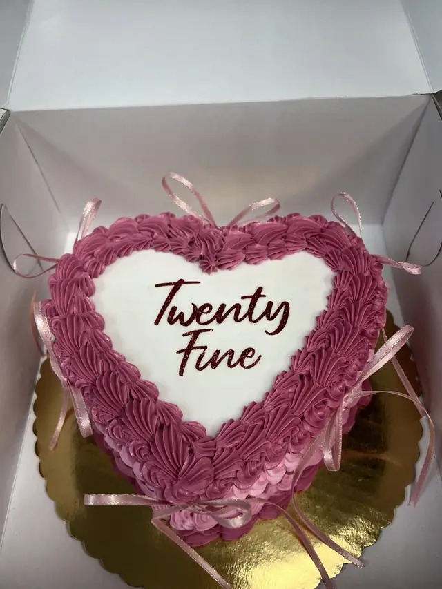 Heart-shaped ombre pink birthday cake at Lu's