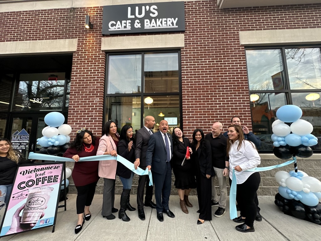 Ribbon-cutting celebration at Lu's Cafe & Bakery new Essex Street location, 2025