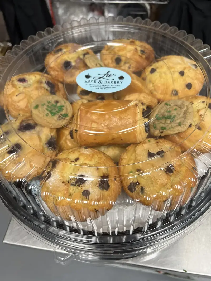 Breakfast catering platter of muffins and pastries with the Lu's Cafe & Bakery label