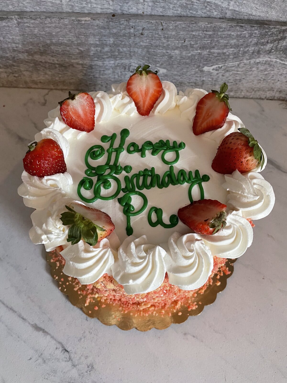 Strawberry whipped cream birthday cake at Lu's