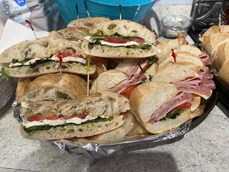 Italian sub and caprese sandwich catering platter from Lu's Cafe & Bakery in Lawrence, MA