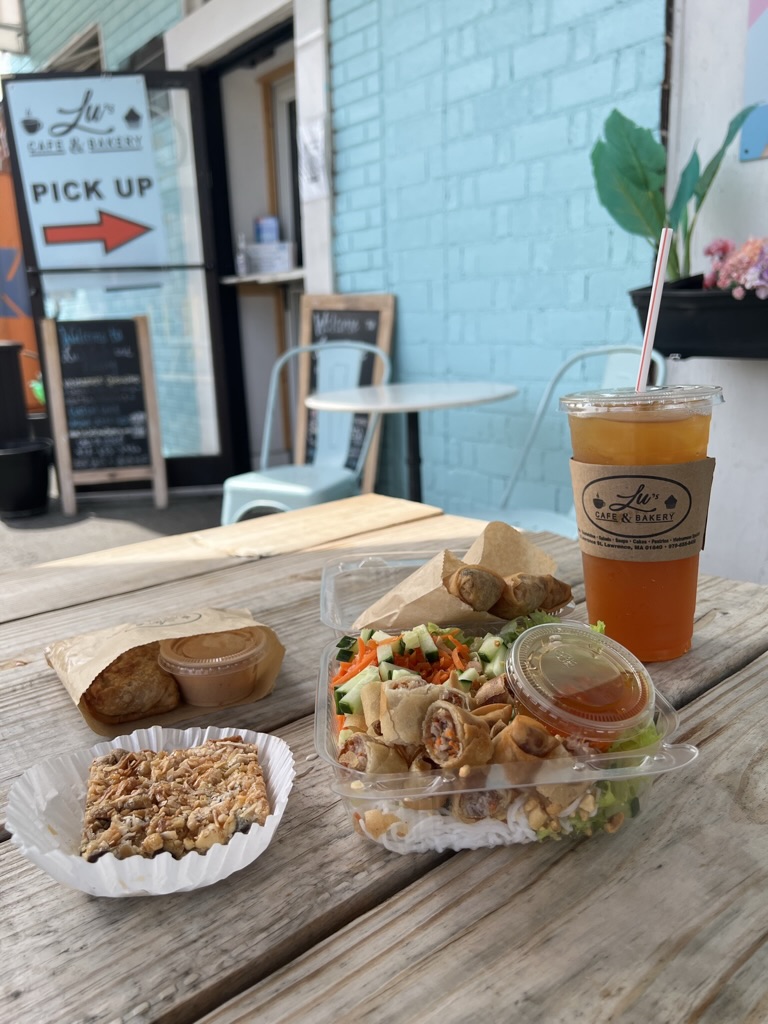 Vermicelli bowl with egg rolls and Vietnamese iced tea at Lu's Cafe & Bakery